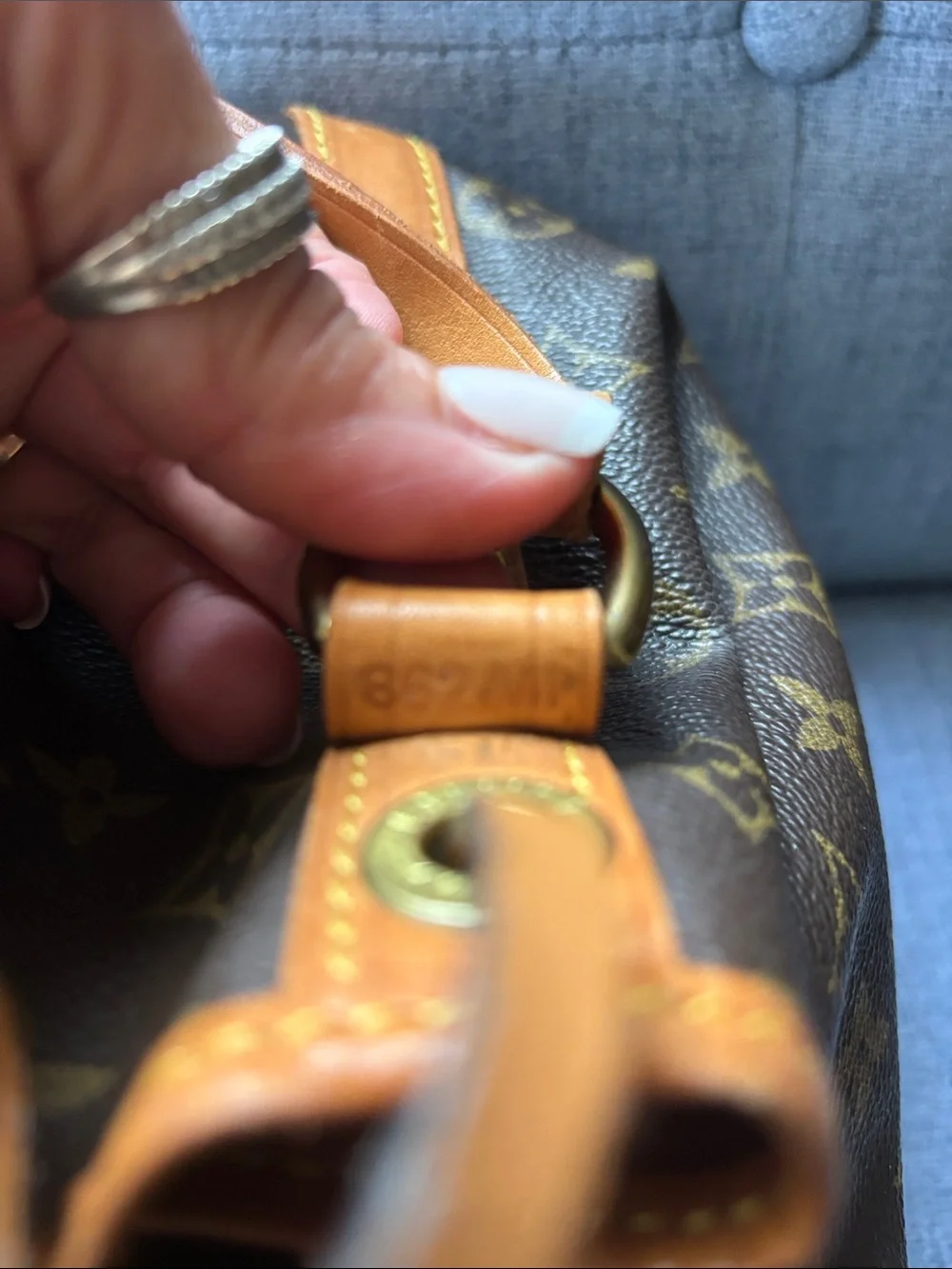 Louis Vuitton Monogram Canvas Drawstring Hobo in Brown and Tan
